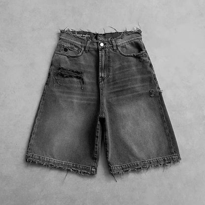 Men’s Vintage Distressed Black Jeans. Heavyweight cotton denim with a loose fit, wide-leg bootcut flared silhouette, and vintage washed finish. Durable, comfortable, and perfect for streetwear, casual outfits, and modern urban fashion.