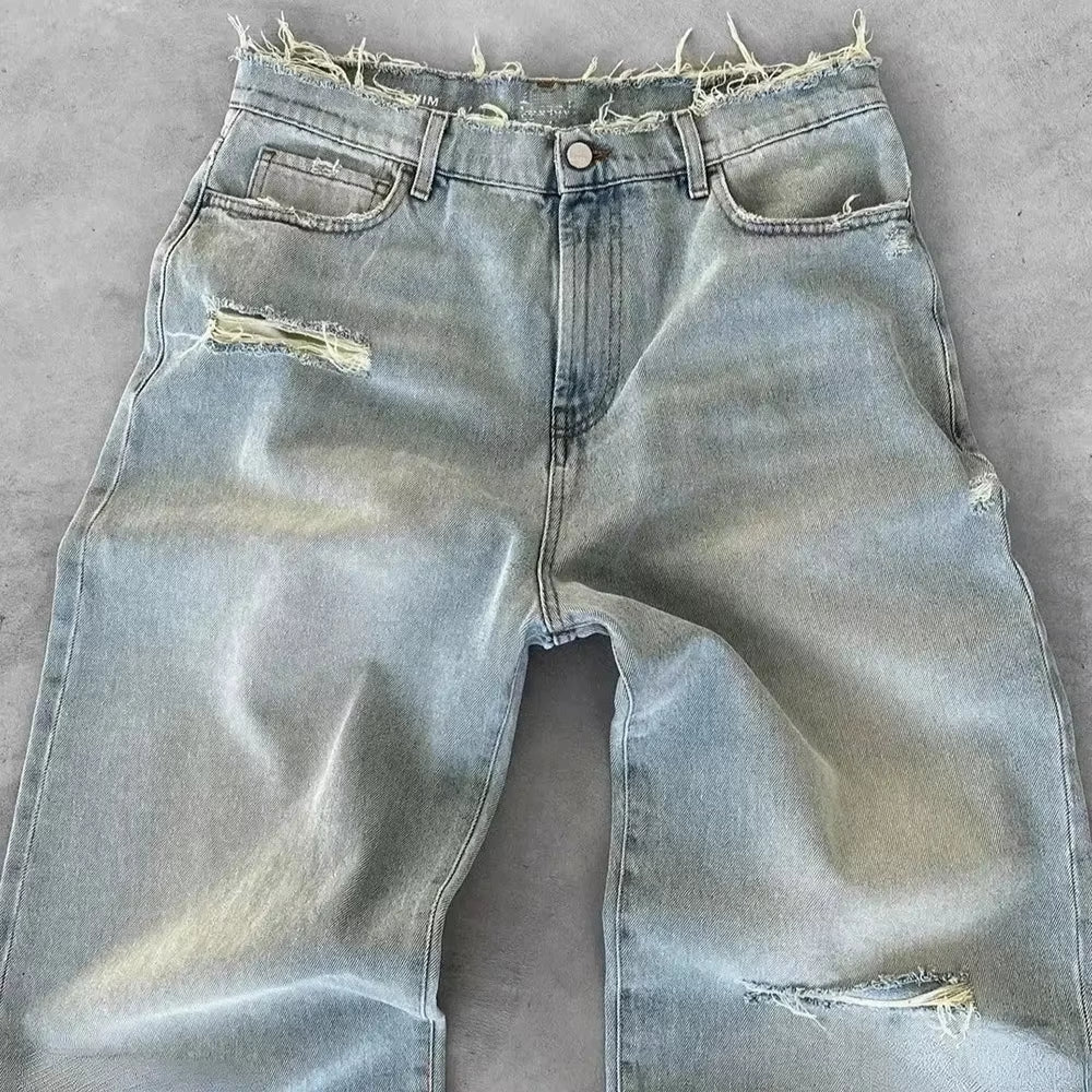 Men’s Vintage Distressed Black Jeans. Heavyweight cotton denim with a loose fit, wide-leg bootcut flared silhouette, and vintage washed finish. Durable, comfortable, and perfect for streetwear, casual outfits, and modern urban fashion.