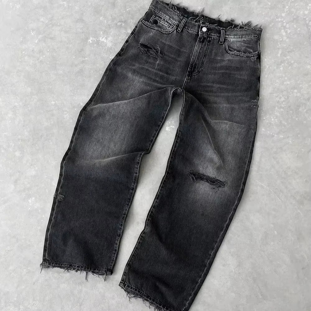 Men’s Vintage Distressed Black Jeans. Heavyweight cotton denim with a loose fit, wide-leg bootcut flared silhouette, and vintage washed finish. Durable, comfortable, and perfect for streetwear, casual outfits, and modern urban fashion.
