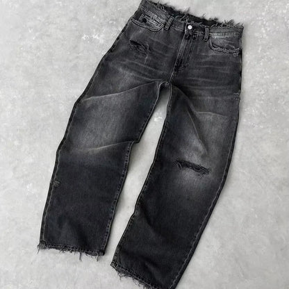 Men’s Vintage Distressed Black Jeans. Heavyweight cotton denim with a loose fit, wide-leg bootcut flared silhouette, and vintage washed finish. Durable, comfortable, and perfect for streetwear, casual outfits, and modern urban fashion.